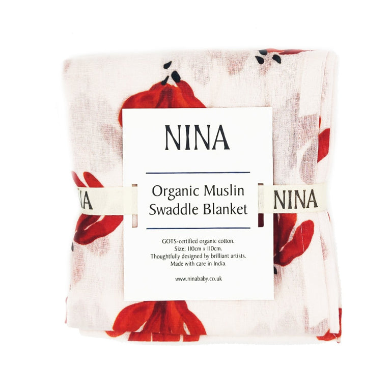 Organic muslin swaddle blanket in NINA packaging